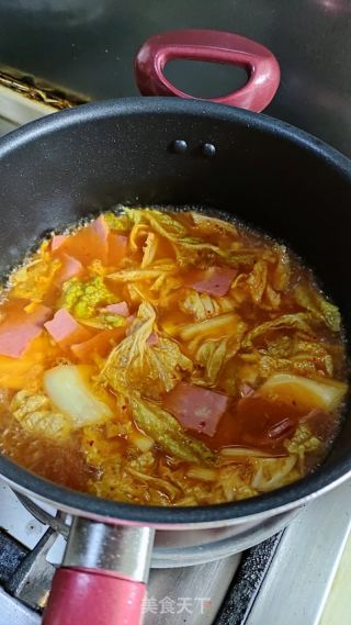 芝士泡菜煮年糕的做法步驟：9
